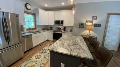 Enjoy cooking in the kitchen, with 2 coffee makers, a crock pot, blender & more