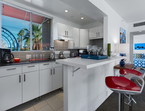 Deluxe Room, 1 King Bed | Private kitchen | Full-size fridge, oven, stovetop, espresso maker