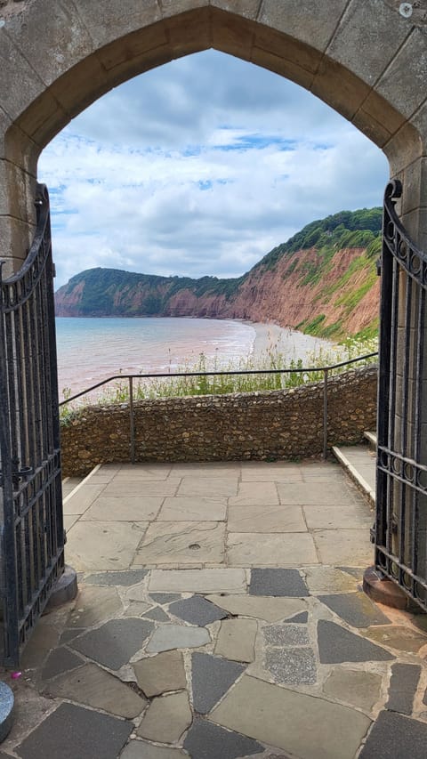 Arch at Connaught Gardens looking to Jacobs Ladder Beach.