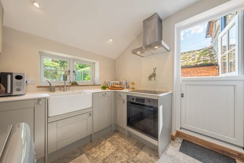 Ground floor: Kitchen with door opening to the garden