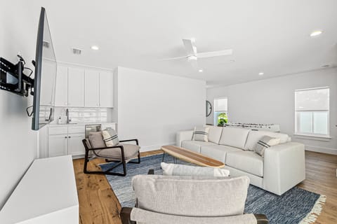 Watch the big game on the wall mounted TV and access to a wet bar to top up your drinks