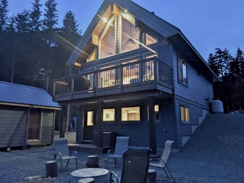 back exterior, hot tub and fire pit
