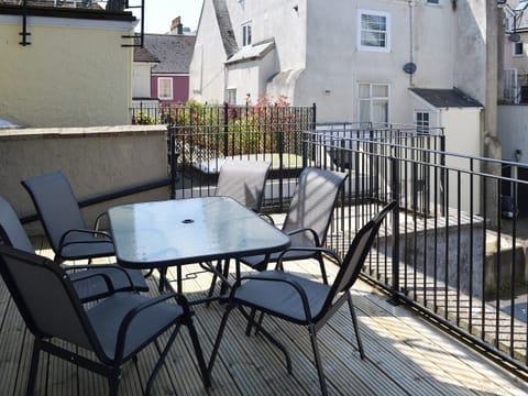 Enjoy an alfresco meal on the balcony | Bank Apartment 1, Dartmouth
