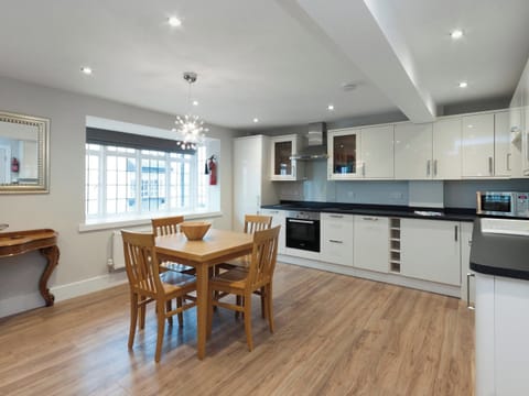 Immaculately presented kitchen/dining area | Bank Apartment 1, Dartmouth