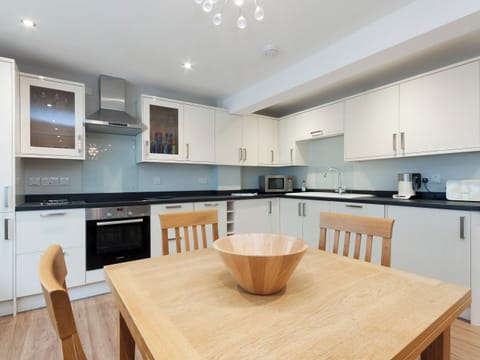 Immaculately presented kitchen/dining area | Bank Apartment 1, Dartmouth