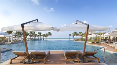 Outdoor pool, open 8:00 AM to 7:00 PM, sun loungers