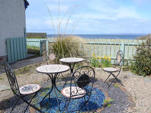 Patio with outdoor eating area | Larachan, Scarfskerry near Castletown