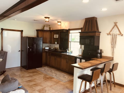 Gourmet Kitchen, fully furnished with all you need to cook your meals