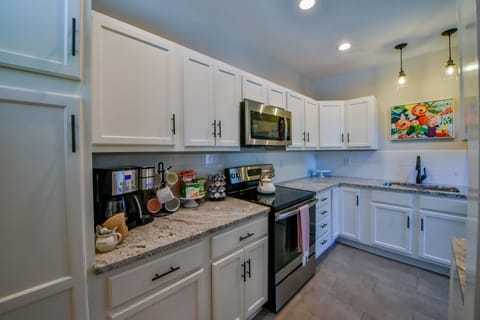 Kitchen - The kitchen has two types of coffee makers so you and your group can stay fully caffeinated during your stay.