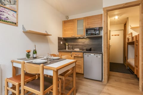 Dining room with built-in kitchen