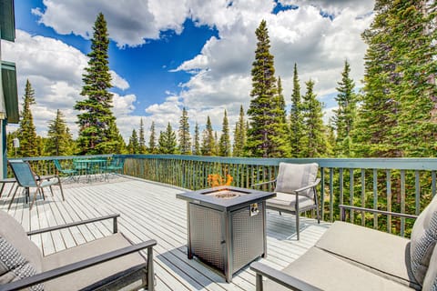 The expansive deck also is yet another area for everyone to enjoy - including a fire table