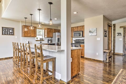 The island will seat extra for drinks or breakfast.