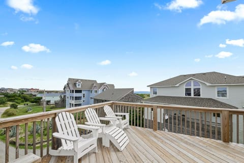 First-level deck with seating, ideal for intimate evenings.