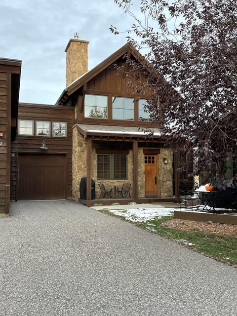 Spacious one car garage that can fit one large SUV plus long driveway.