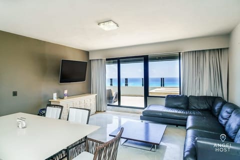 A spacious open layout combining dining and living areas.