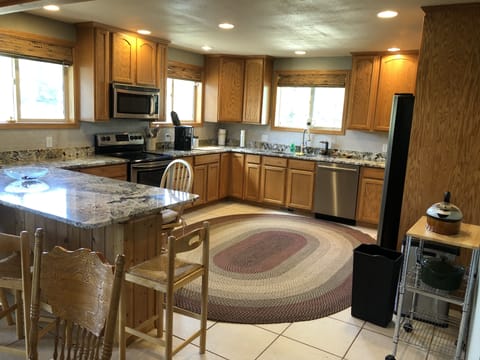 Large kitchen, fully stocked with all the dishes etc you'd ever want.  