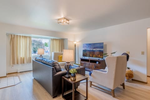 Spacious living room with 65" 4k LED Television