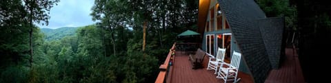 Enjoy this unique A-frame cabin, nestled between the trees, without another home in sight!  The long-distance, year-round views will leave you wishing you could extend your trip even longer. 