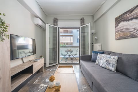 City Apartment | Living area | Flat-screen TV