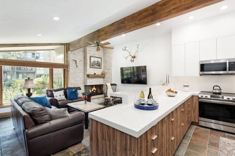 Vaulted ceilings, inviting furnishing and a contemporary kitchen await you in this beautiful vacation rental.