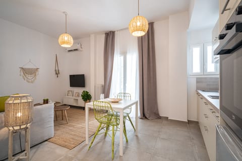 Superior Apartment | Living area | 43-inch flat-screen TV with cable channels
