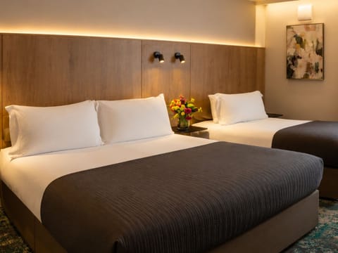Deluxe Triple Room, Non Smoking, Private Bathroom | In-room safe, iron/ironing board, cribs (free), WiFi (free)
