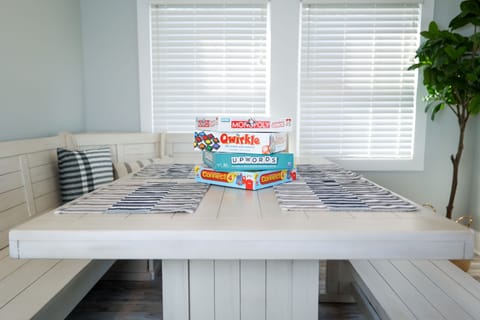 Play board games at the large dining table overlooking the lake.