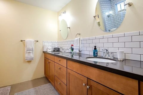 Dual sinks, marble countertops.