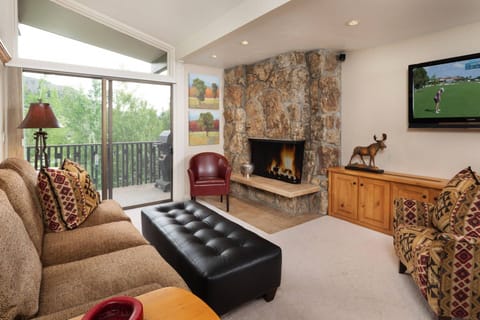 This living room is a welcome retreat when vacationing in the Snowmass area.  You will love the wood burning fireplace!