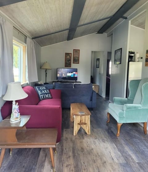 Living area with full size sleeper sofa