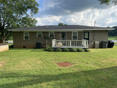 Back of the house with deck