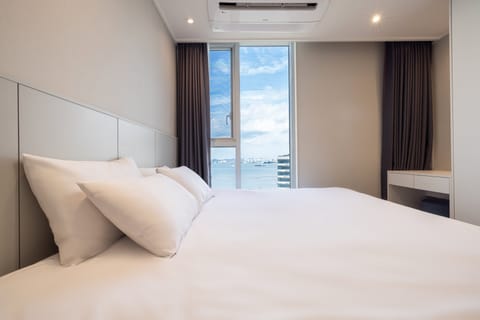Standard King (Half Ocean View) | Select Comfort beds, desk, laptop workspace, blackout drapes