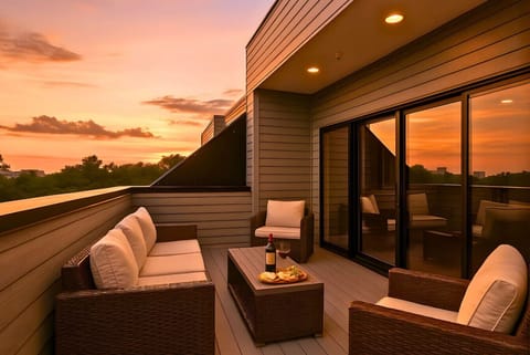 Relax on the covered patio with comfy seating after a long day exploring the city.