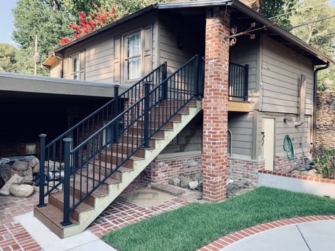 Stairs and entrance to the detached guesthouse