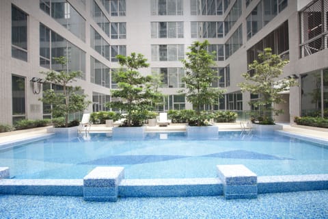 Seasonal outdoor pool, open 8:00 AM to 6:00 PM, pool umbrellas