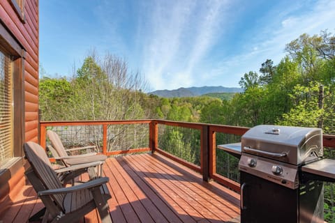 Savor morning coffee on your private deck overlooking the misty mountains, then fire up the grill for an unforgettable barbecue with nature's perfect backdrop.
