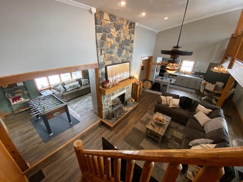 Warm spacious family room with smart TV fireplace