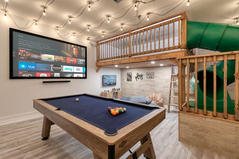Ultimate Game Room: PS5, Fire TV Projector, Playground, Pool Table.