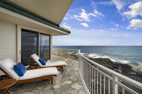 Relax in plush loungers while soaking in breathtaking ocean views and island vibes!