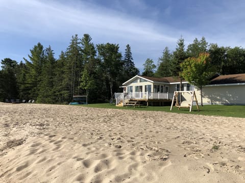 240 feet of private sandy Lake Huron beach.