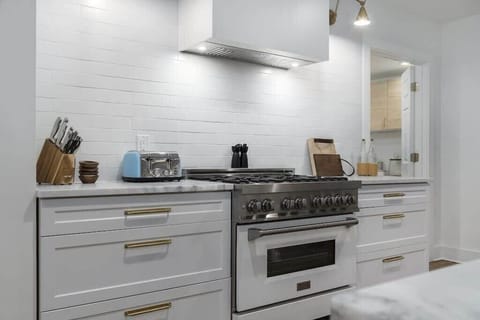 Fully equipped kitchen with sleek design.