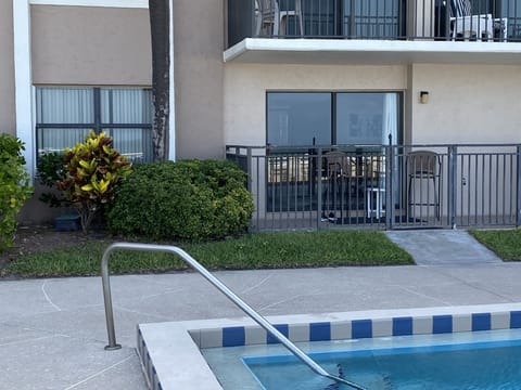 porch and slider door from the pool deck