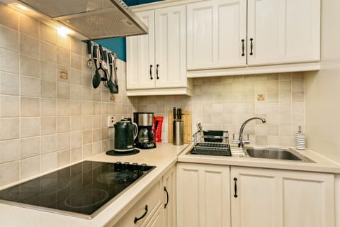Our well-equipped kitchen includes all the essentials you need.