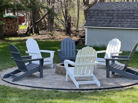 New addition! Woodburning firepit with seating for 6-8.