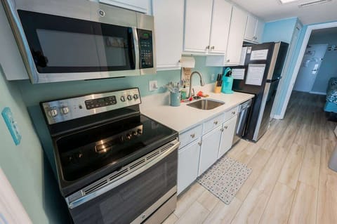 Full Sized Appliances in Kitchen Area, Beautifully Decorated