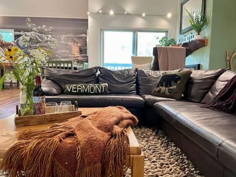 Unwind on the comfy leather couch after a day of adventure.