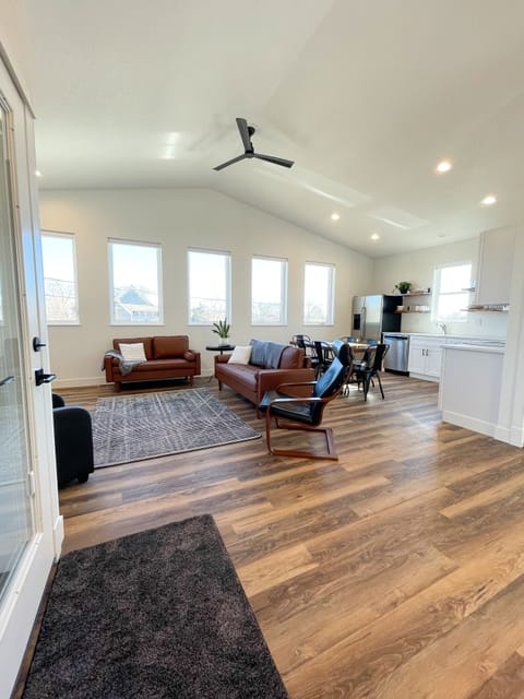 Windows line the open floor plan giving a bright, light filled living space.