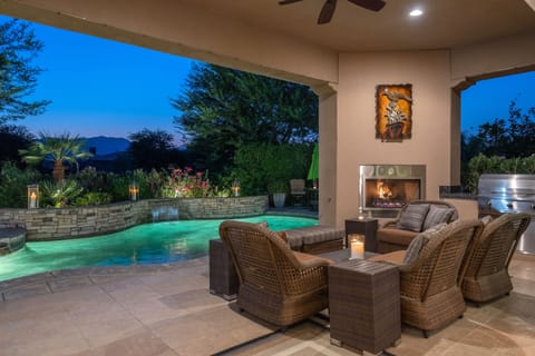 Outdoor fireplace with seating area