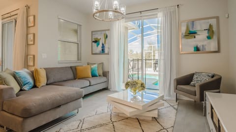 Living room overlooking patio pool area