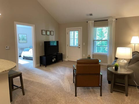 Vaulted ceilings w/plenty of seating and natural light. 50" Roku Smart TV w/DirecTV included.